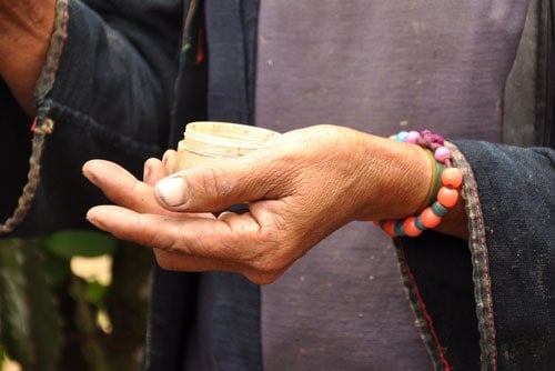 Hand-with-beads